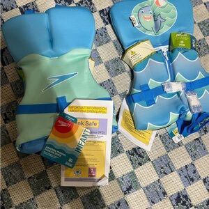 2 New infant Speedo life jackets up to 30lbs